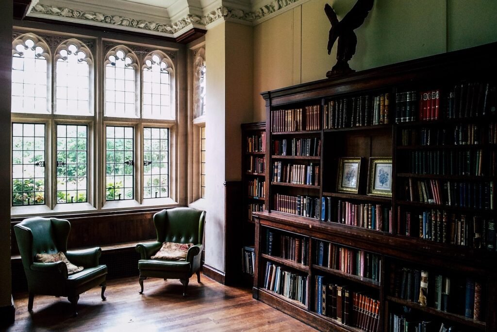 Two armchairs by a window in a quiet room